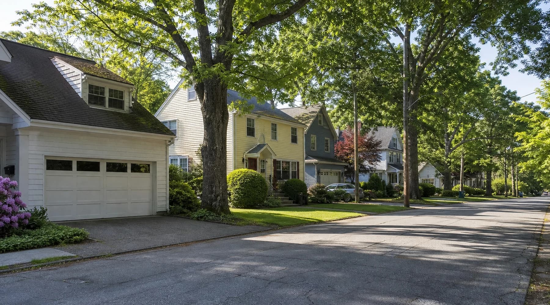 Quiet Connecticut neighborhood with homes and garages